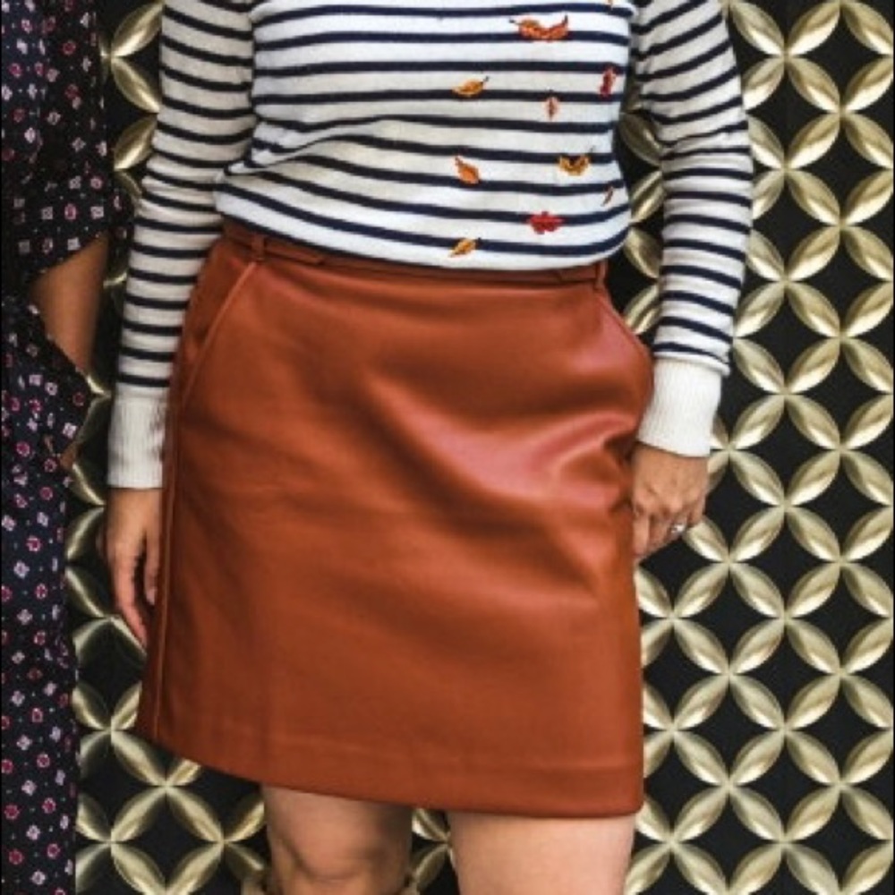 Brown faux leather mini skirt.